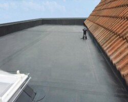 Flat roof and pitched tiled roof detail