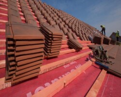 New roof tiles and breathable membrane being installed