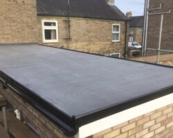 Rubber flat roof with new fascia and guttering
